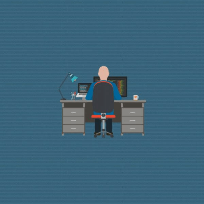 Cartoon of a person sitting at their desk.