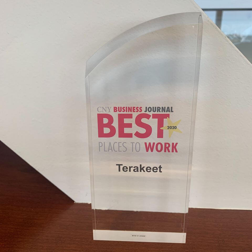 glass award from CNY Business Journal 