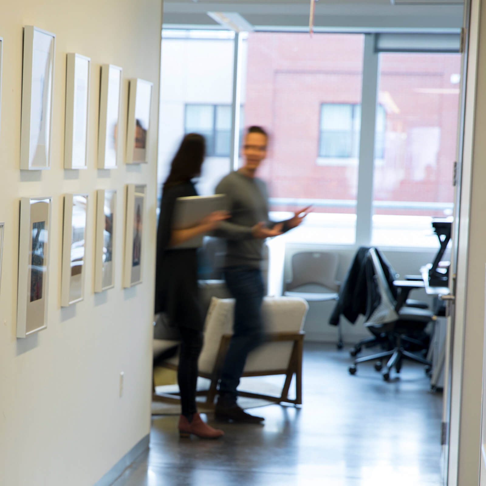 two terakeet employees walking down a hallway