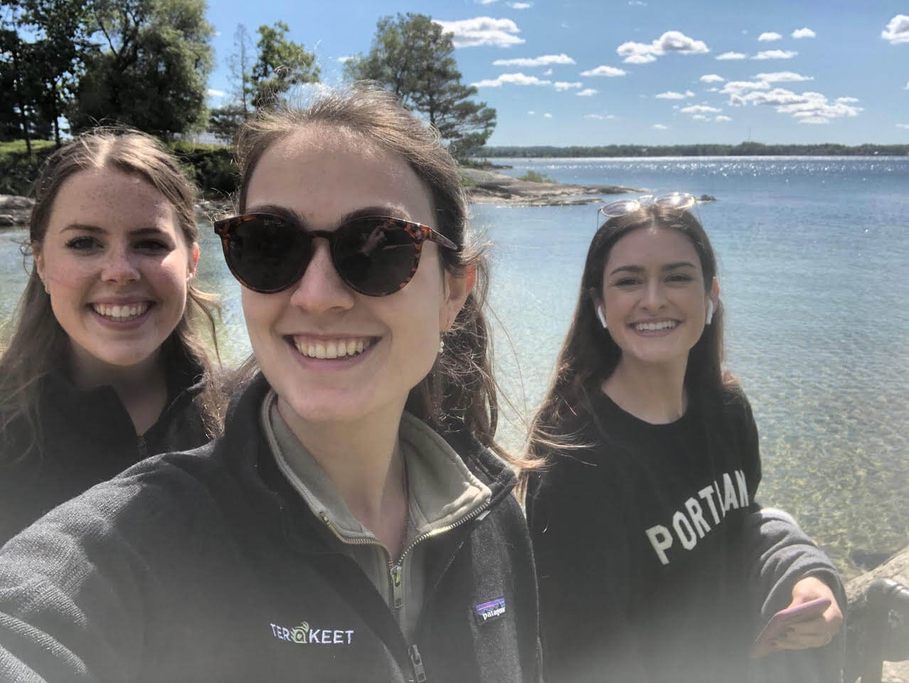 Terakeet employees and friends spending time on a walk near water