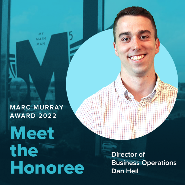 A man smiles along the words "Meet the Honoree, Director of Business Operations Dan Heil"